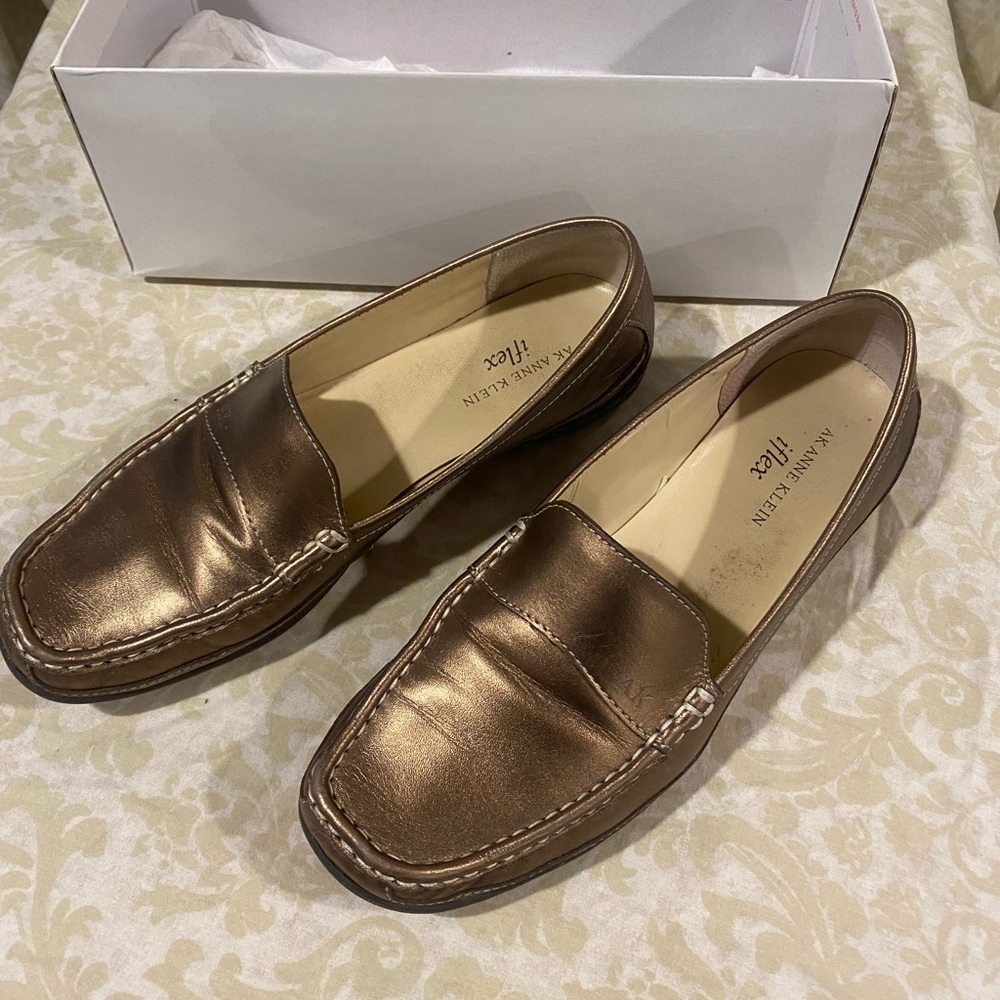 Bronze loafers in good condition.